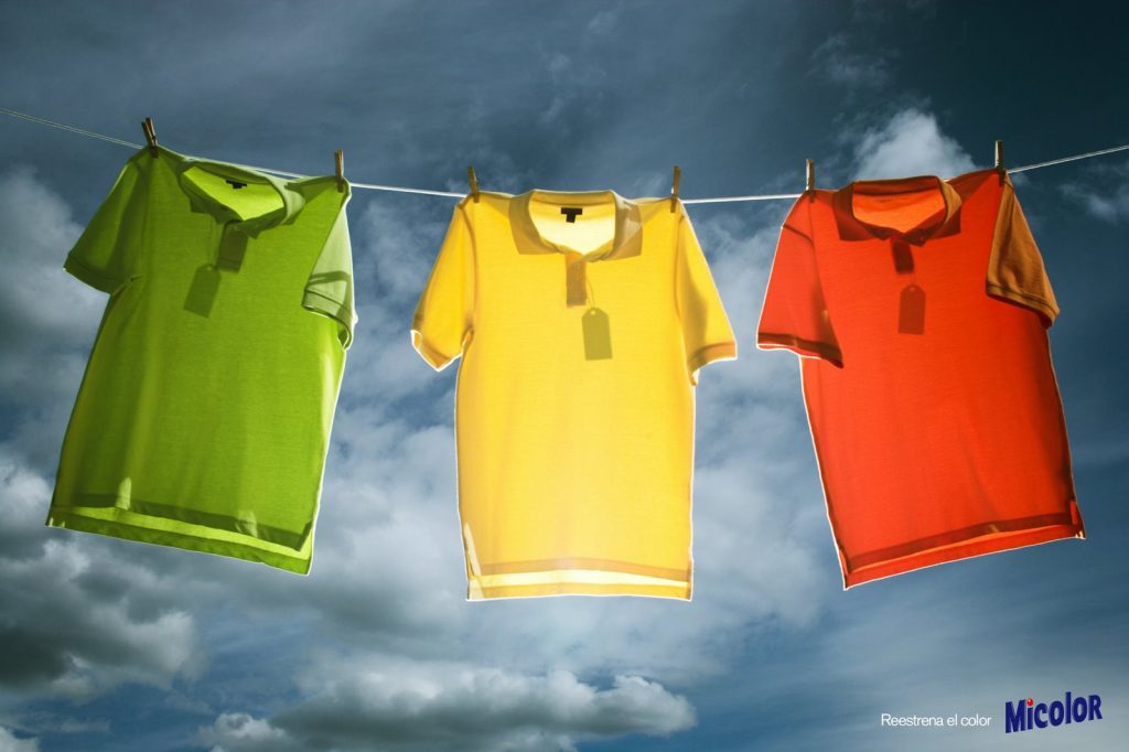 Low angle view of polo shirts pined on a clothesline